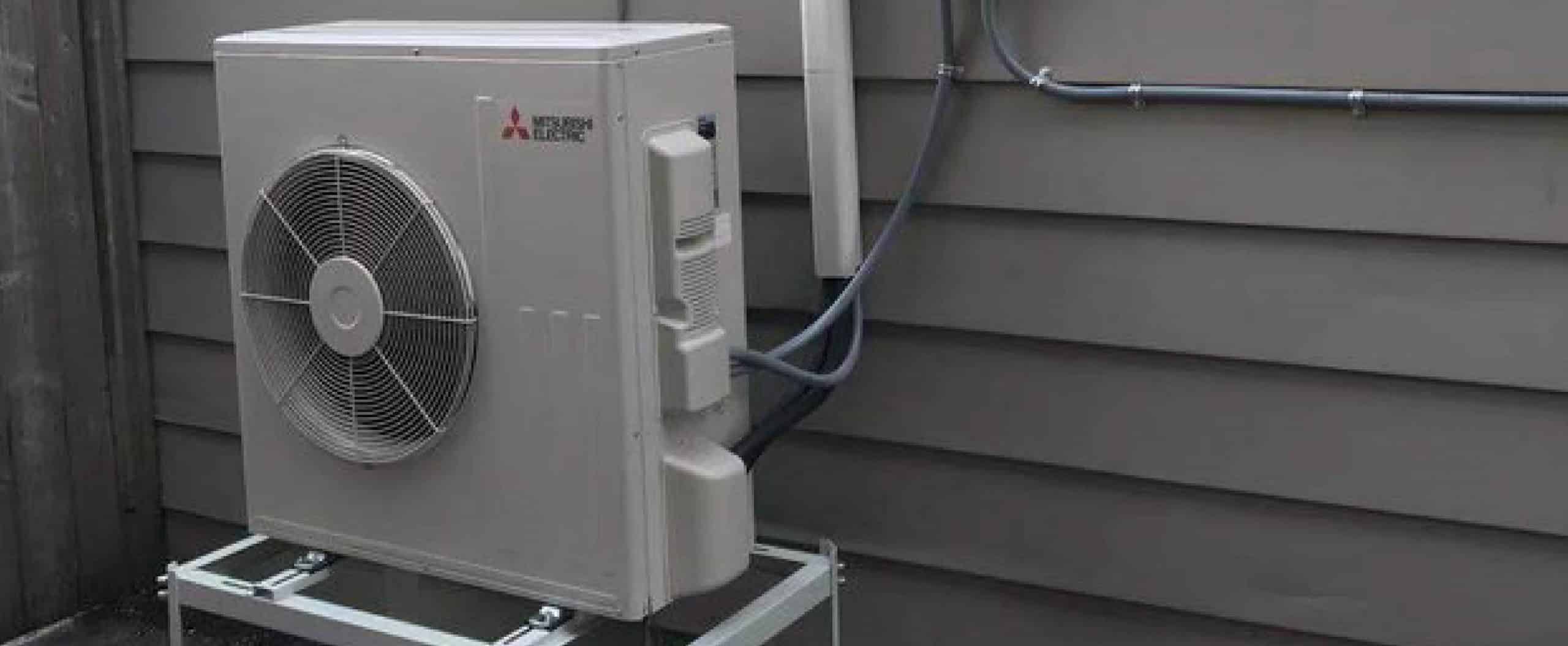 heat pump installed outside of house